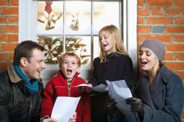 Family Christmas Carols | 25 Must Do Family Christmas Bucket List Ideas 