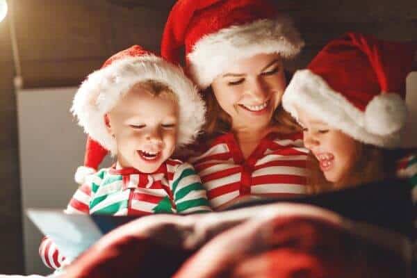 Reading Christmas Books |  25 Must Do Family Christmas Bucket List Ideas