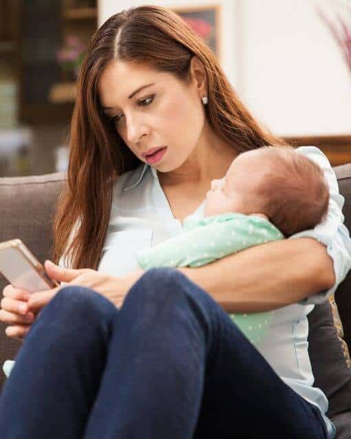Holding Baby While Texting Teen | For All The Parents Raising Teenagers And Toddlers At The Same Time