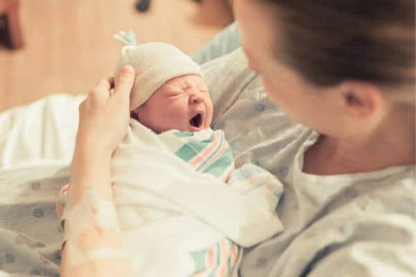 Mom Holding New Born Baby | Four Words My Husband Spoke To Me That Changed Everything