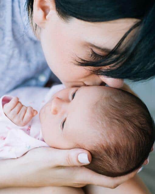 Mom Kissing Baby | Four Words My Husband Spoke To Me That Changed Everything