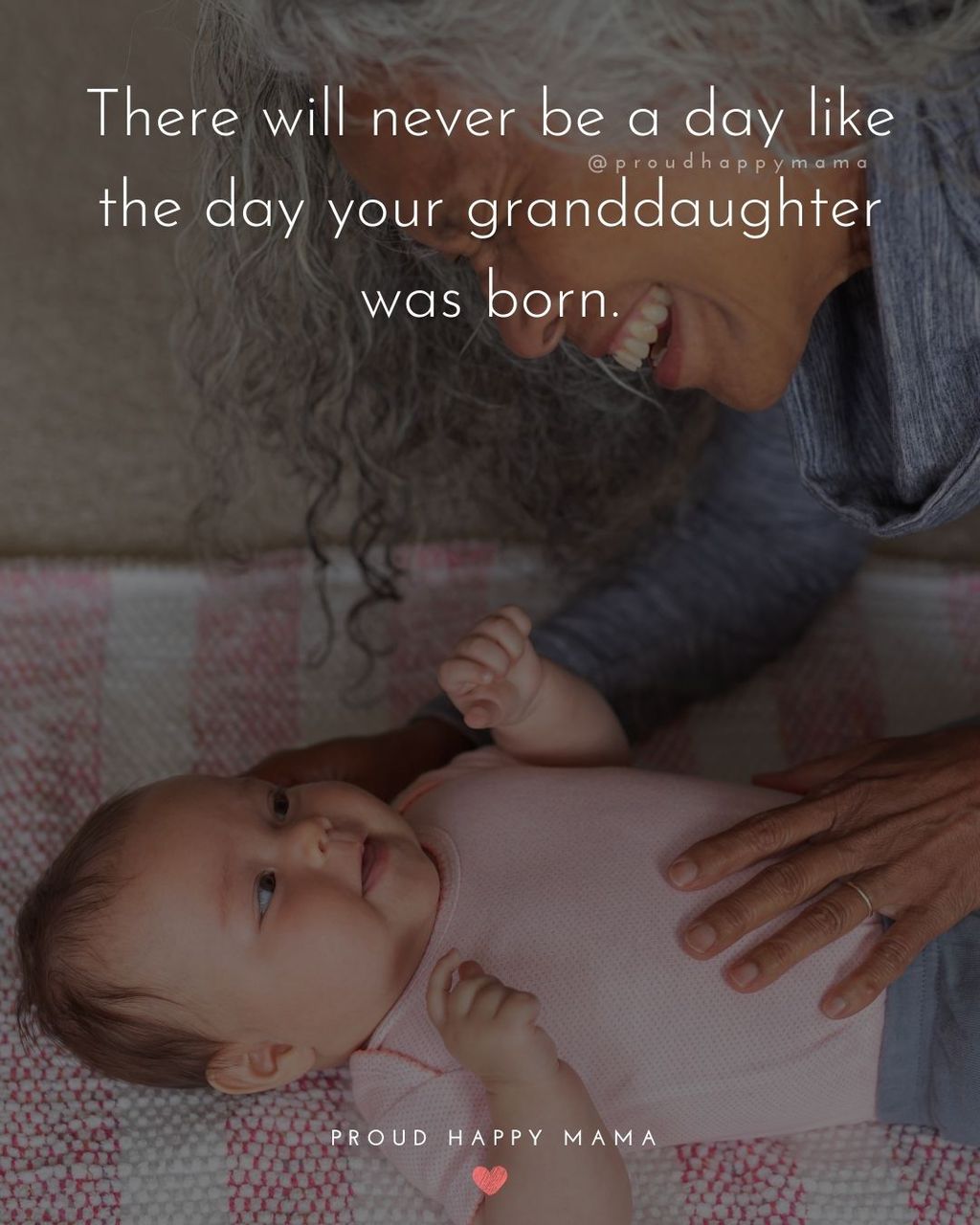 Grandmother with long gray hair looking down at baby granddaughter smiling with text overlay, ‘There will never be a day like the day your granddaughter was born.’