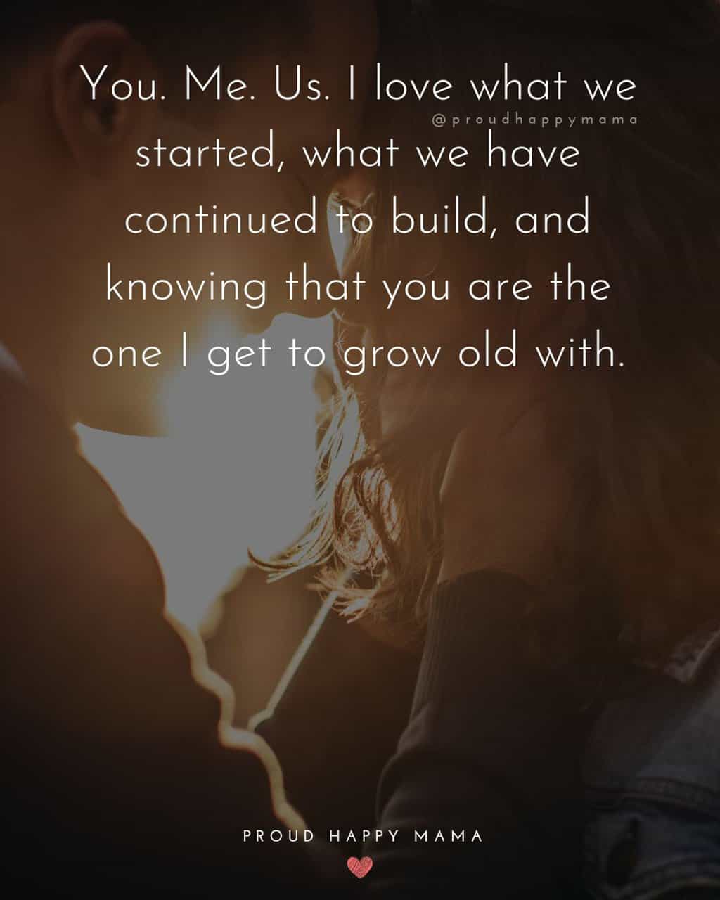 Husband with two hands on wife's face with foreheads touching and a husband wife quote text overlay. ‘You. Me. Us. I love what we started, what we have continued to build, and knowing that you are the one I get to grow old with.’