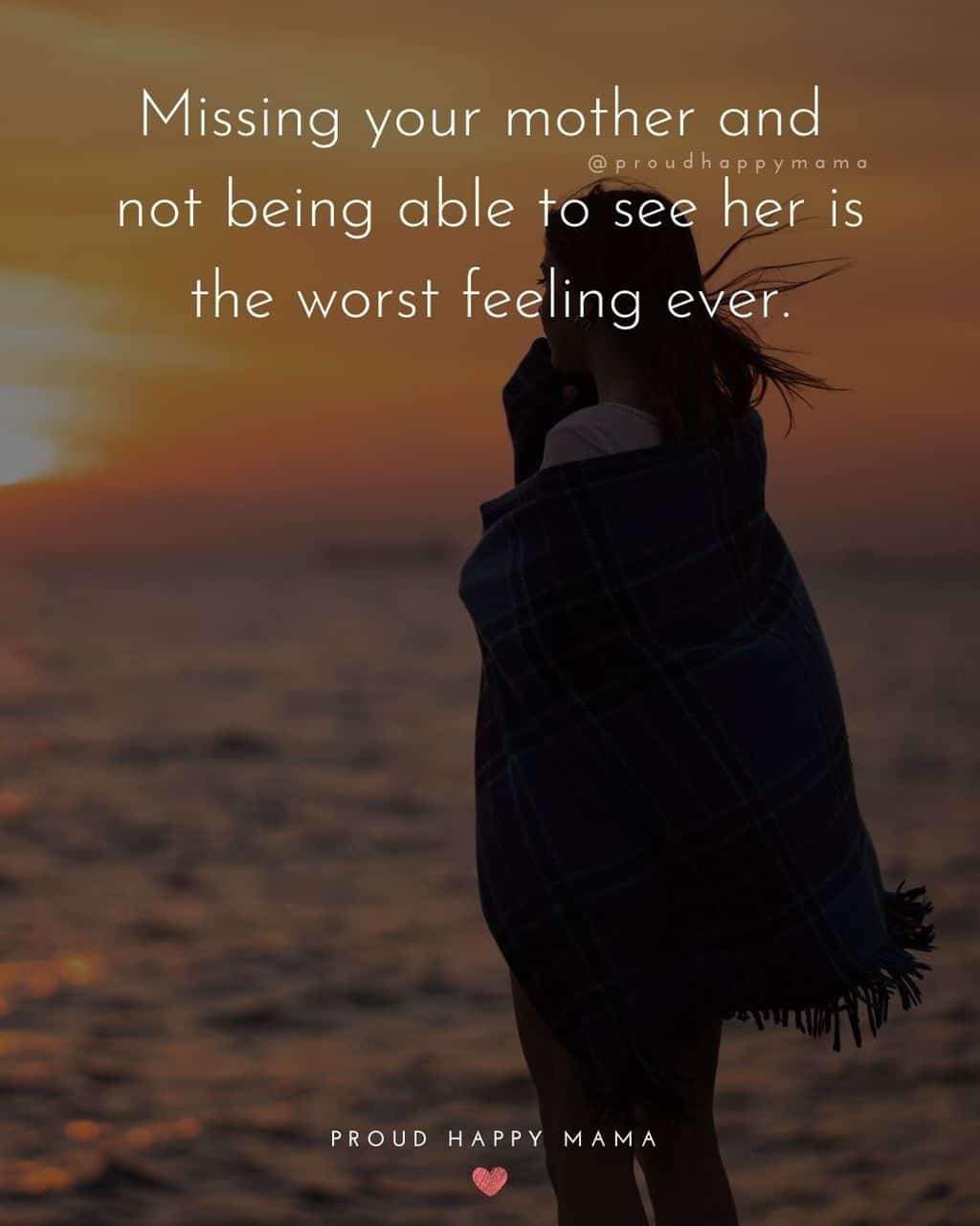 Woman wrapped in a blanket looking out to the ocean with text overlay, ‘Missing your mother and not being able to see her is the worst feeling ever.’