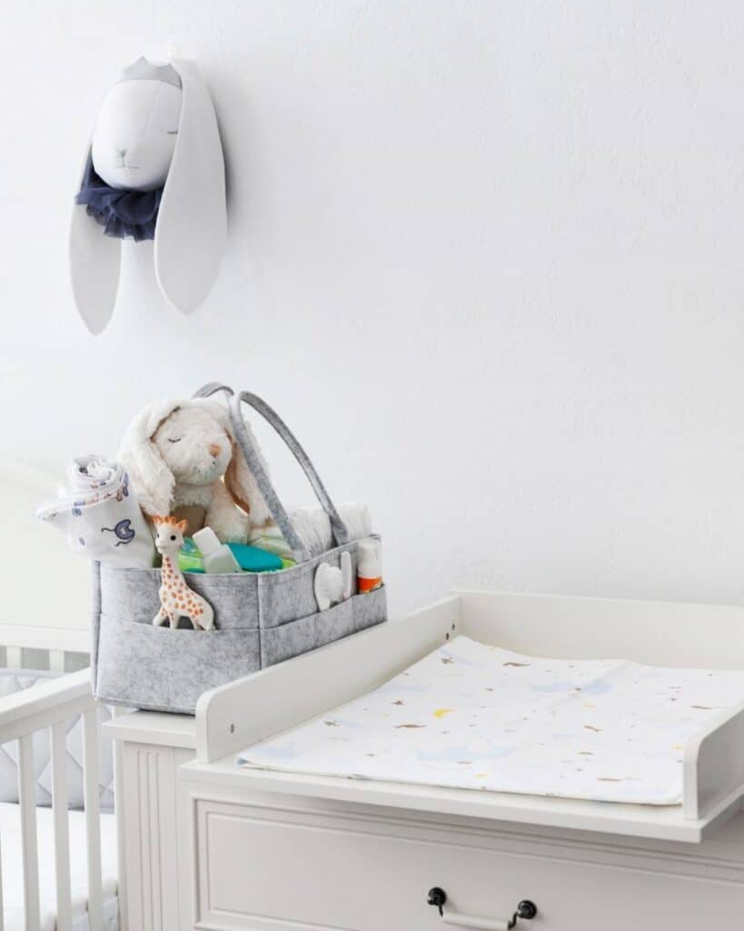 diaper-caddy-essentials-next-to-changing-table
