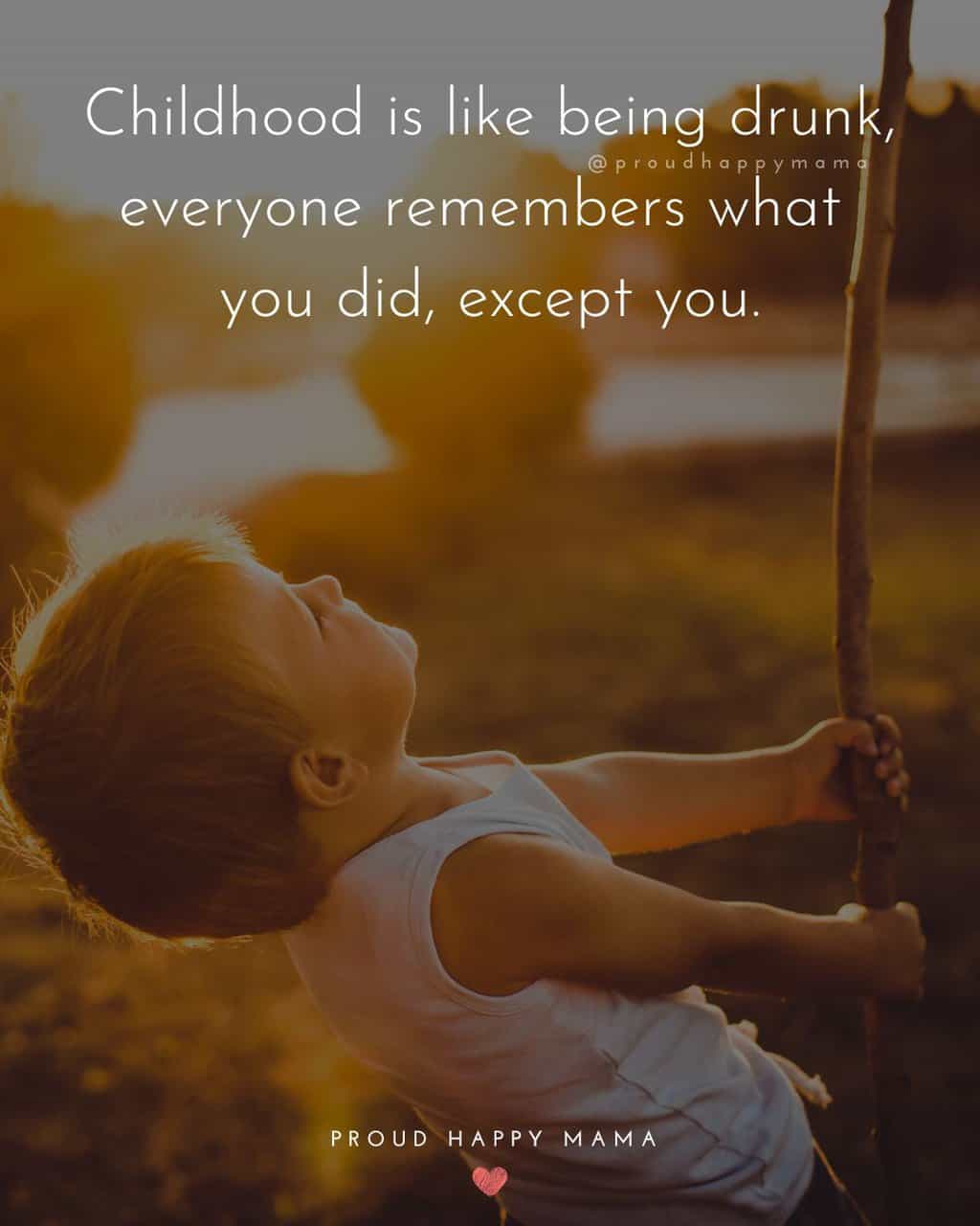 Young boy in singlet holding onto a stick looking up to the sky with a happy childhood quote text overlay. ‘Childhood is like being drunk, everyone remembers what you did, except you.’