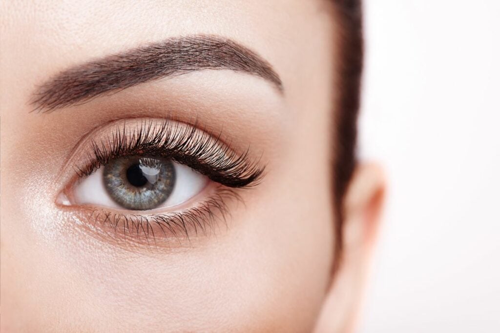 Close up of woman's eye with long lashes