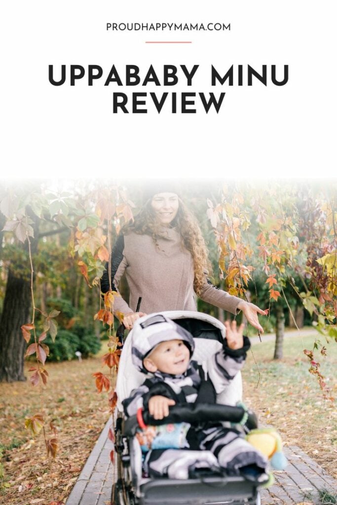 Mother walking towards the camera with baby in a stroller. With 'Uppababy Minu review' text overlay.