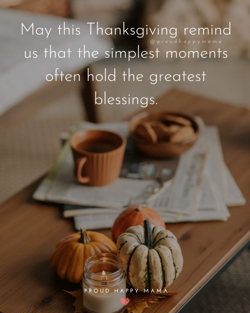 Thanksgiving quote overlay that reads “May this Thanksgiving remind us that the simplest moments often hold the greatest blessings” with pumpkins, a candle, and coffee on a cozy autumn table.